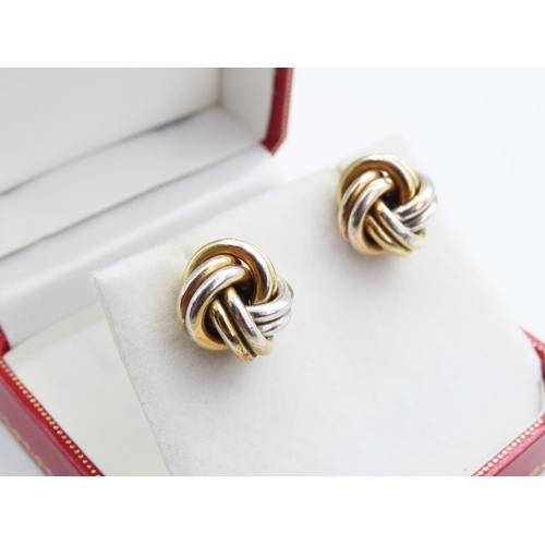 291 - Pair of White and Yellow 9 Carat Gold Twist Motif Ladies Earrings Each 1.5cm Diameter