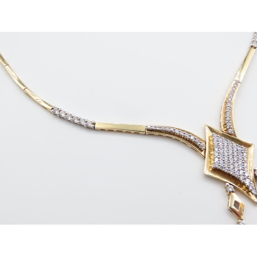 304 - 14 Carat Yellow Gold Diamond Set Ladies Necklace Modernist Form Attractively Detailed 42cm Long Cert... 