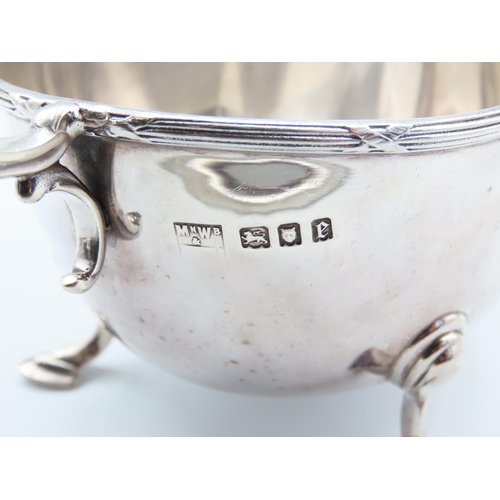 320 - Silver Sauceboat Flying C Scroll Handle above Shaped Supports 15cm Wide x 10cm High