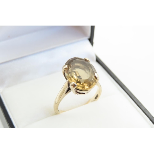 35 - Smokey Quartz Statement Ring Oval Cut Four Claw Setting Mounted on 9 Carat Yellow Gold Band Ring Siz... 
