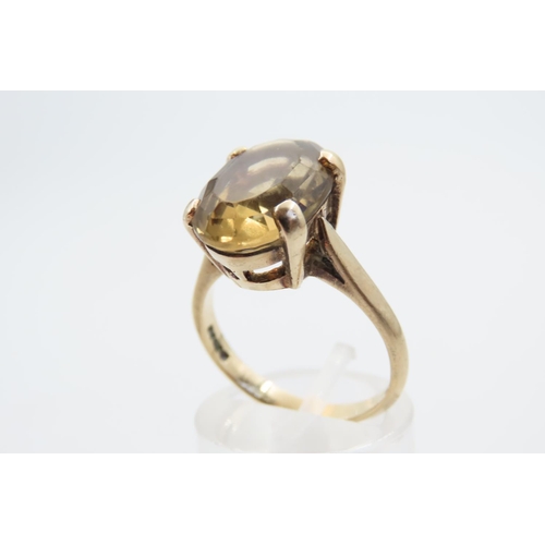 35 - Smokey Quartz Statement Ring Oval Cut Four Claw Setting Mounted on 9 Carat Yellow Gold Band Ring Siz... 