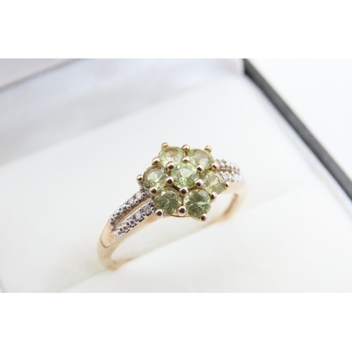 39 - Peridot and Diamond Ladies Cluster Ring Mounted on 9 Carat Yellow Gold Band Ring Size N