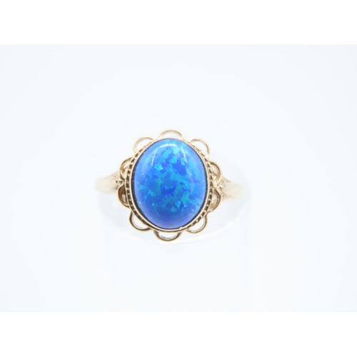 41 - Blue Opal Centre Stone Ring Mounted on 9 Carat Yellow Gold Band Ring Size N