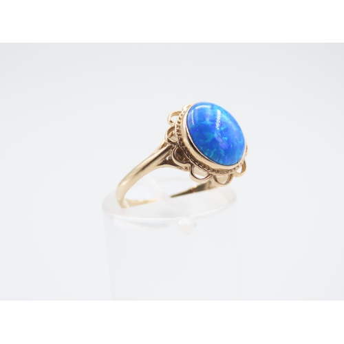 41 - Blue Opal Centre Stone Ring Mounted on 9 Carat Yellow Gold Band Ring Size N