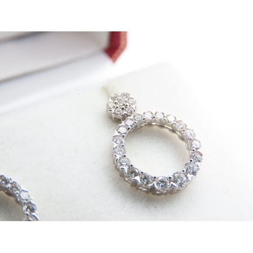 46 - Pair of Platinum Set Ladies Diamond Mounted Earrings Circular Form Each 1cm Diameter