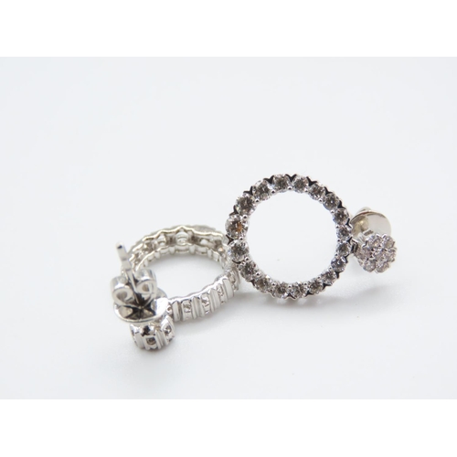 46 - Pair of Platinum Set Ladies Diamond Mounted Earrings Circular Form Each 1cm Diameter