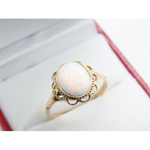 52 - Centre Stone  9 Carat Yellow Gold Ladies Ring Set with Opal Cabochon Cut Ring Size P
