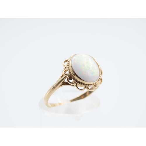 52 - Centre Stone  9 Carat Yellow Gold Ladies Ring Set with Opal Cabochon Cut Ring Size P