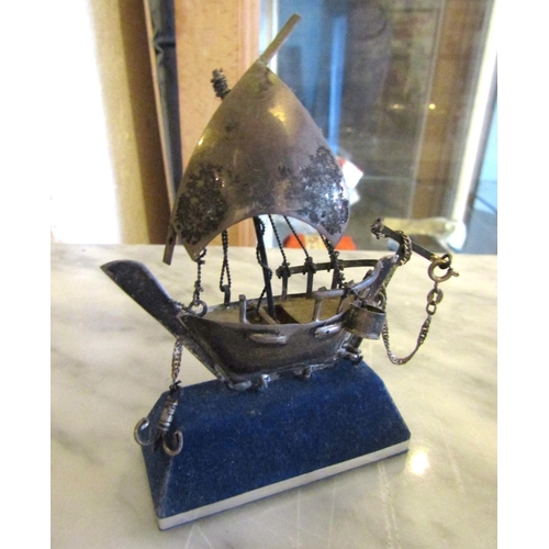 695 - Silver Model of Galleon Mounted on Rectangular Form Blue Velvet Stand Approximately 8cm High