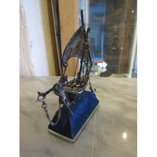 695 - Silver Model of Galleon Mounted on Rectangular Form Blue Velvet Stand Approximately 8cm High