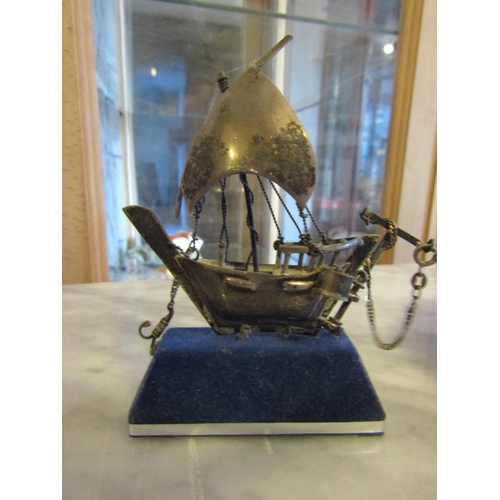 695 - Silver Model of Galleon Mounted on Rectangular Form Blue Velvet Stand Approximately 8cm High