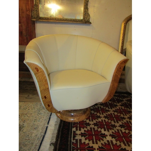 700 - Pair of Maple Framed Cream Leather Upholstered Modernist Form Armchairs Generous Size Swivel Bases