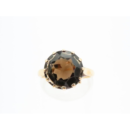 77 - Smokey Quartz Centre Stone Ring Mounted on 9 Carat Yellow Gold Band Ring Size N