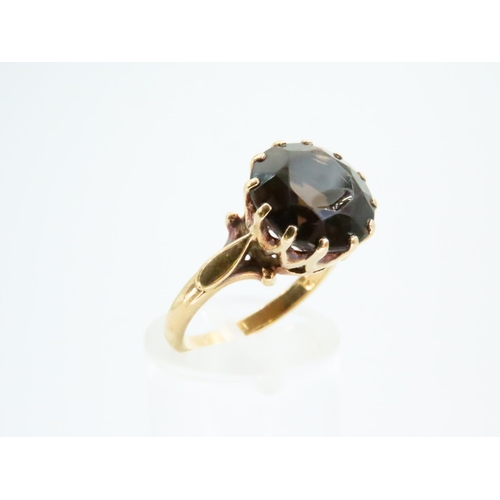 77 - Smokey Quartz Centre Stone Ring Mounted on 9 Carat Yellow Gold Band Ring Size N