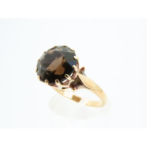 77 - Smokey Quartz Centre Stone Ring Mounted on 9 Carat Yellow Gold Band Ring Size N