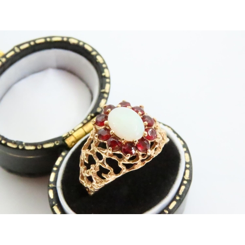 78 - Opal and Red Garnet Ladies Cluster Ring Mounted on 18 Carat Yellow Gold Band Ring Size O