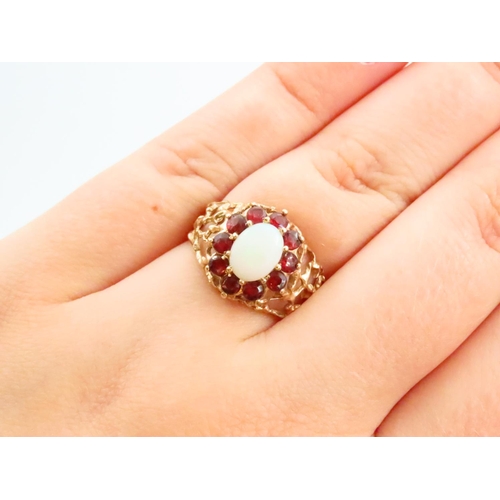 78 - Opal and Red Garnet Ladies Cluster Ring Mounted on 18 Carat Yellow Gold Band Ring Size O