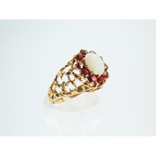 78 - Opal and Red Garnet Ladies Cluster Ring Mounted on 18 Carat Yellow Gold Band Ring Size O