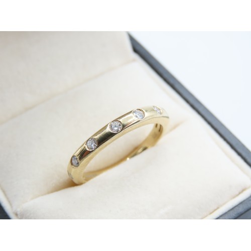 294 - Seven Stone 9 Carat Yellow Gold Ladies Band Ring Size N and a Half