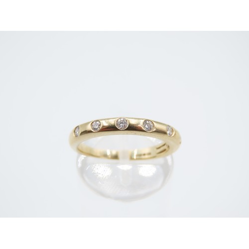 294 - Seven Stone 9 Carat Yellow Gold Ladies Band Ring Size N and a Half