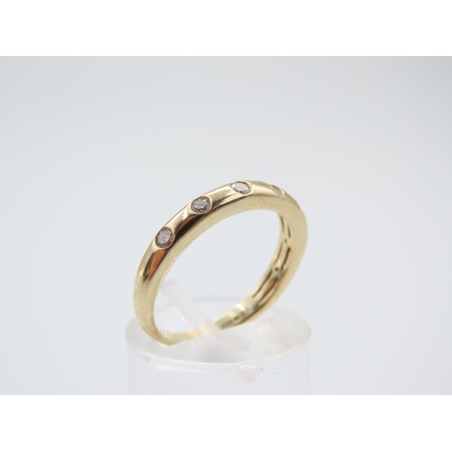 294 - Seven Stone 9 Carat Yellow Gold Ladies Band Ring Size N and a Half