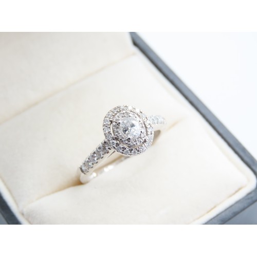 296 - Diamond Solitaire Ring Halo Set Mounted on 18 Carat White Gold Shoulders Further Diamond Set Attract... 