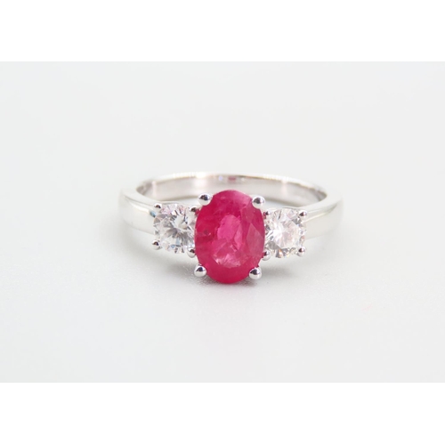 101 - Ruby Centre Stone Ring with Diamonds to Either Shoulder Mounted on 18 Carat White Gold Ring Size N