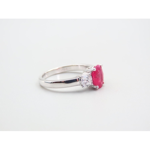 101 - Ruby Centre Stone Ring with Diamonds to Either Shoulder Mounted on 18 Carat White Gold Ring Size N