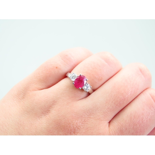 101 - Ruby Centre Stone Ring with Diamonds to Either Shoulder Mounted on 18 Carat White Gold Ring Size N