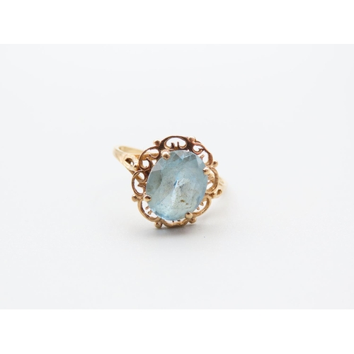 114 - Aquamarine Centre Stone Ladies Ring Mounted on 9 Carat Yellow Gold Band Ring Size M and A Half