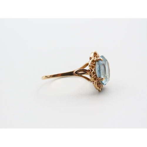 114 - Aquamarine Centre Stone Ladies Ring Mounted on 9 Carat Yellow Gold Band Ring Size M and A Half