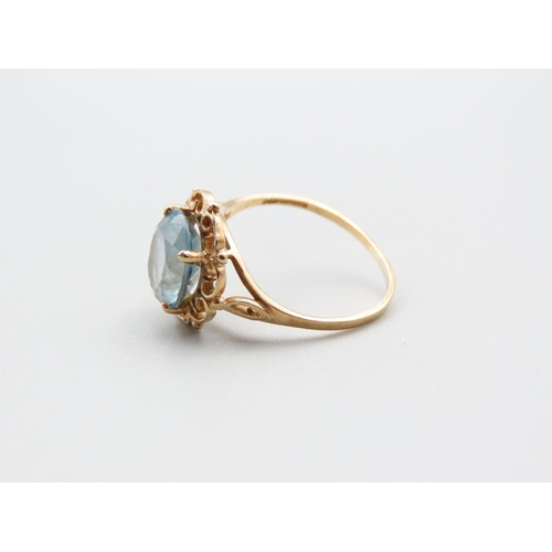 114 - Aquamarine Centre Stone Ladies Ring Mounted on 9 Carat Yellow Gold Band Ring Size M and A Half