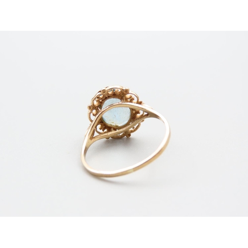 114 - Aquamarine Centre Stone Ladies Ring Mounted on 9 Carat Yellow Gold Band Ring Size M and A Half