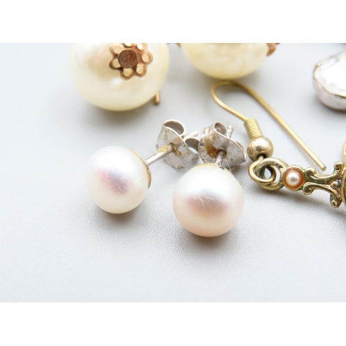 115 - Four Pairs of Ladies Earrings Three Pairs Pearl Set and One Cluster Necklace Pendant