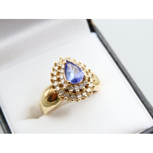 135 - Tanzanite and Diamond 14 Carat Yellow Gold Cluster Ring Size K