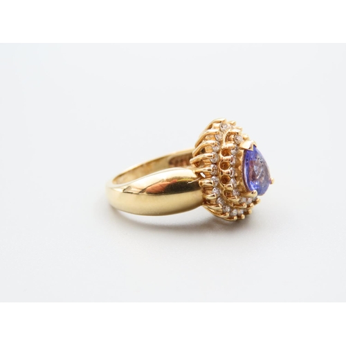 135 - Tanzanite and Diamond 14 Carat Yellow Gold Cluster Ring Size K