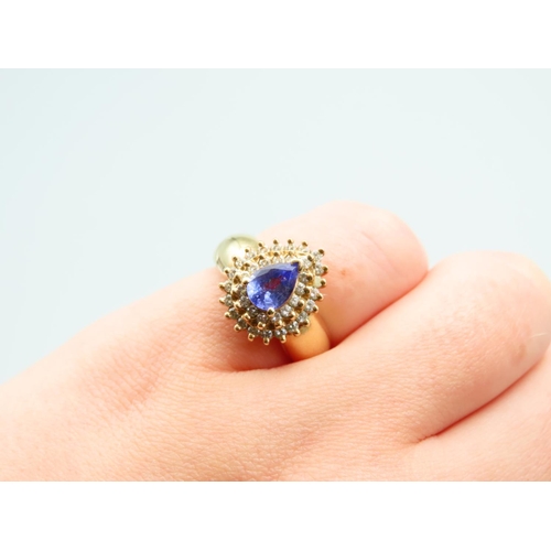 135 - Tanzanite and Diamond 14 Carat Yellow Gold Cluster Ring Size K