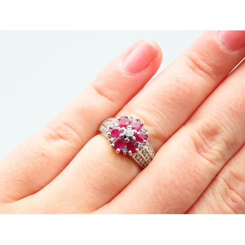 144 - Ruby and Diamond Cluster Ring Mounted on 14 Carat Yellow Gold Band Ring Size N