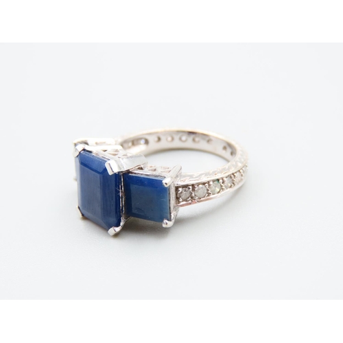 147 - Sapphire and Diamond Three Stone Ring Further Set Diamonds to Shoulders Mounted on 14 Carat White Go... 