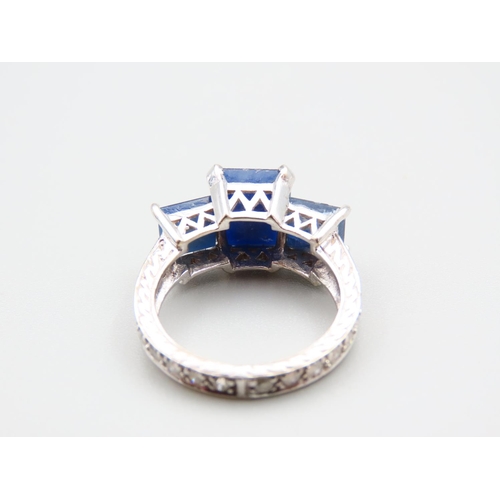 147 - Sapphire and Diamond Three Stone Ring Further Set Diamonds to Shoulders Mounted on 14 Carat White Go... 