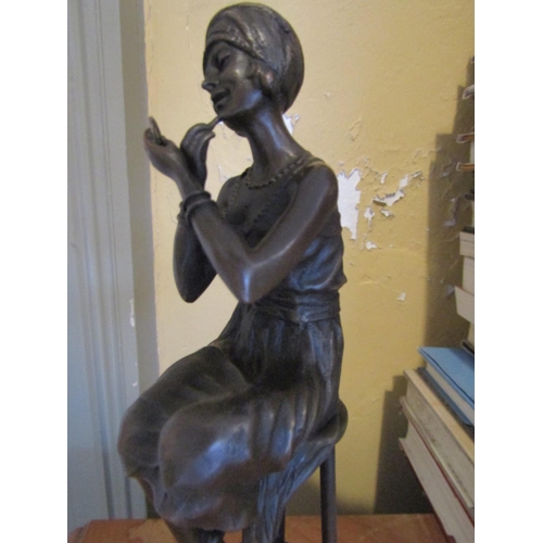 1472 - Bronze Sculpture Seated Art Deco Lady Applying Lipstick Approximately 9 Inches High