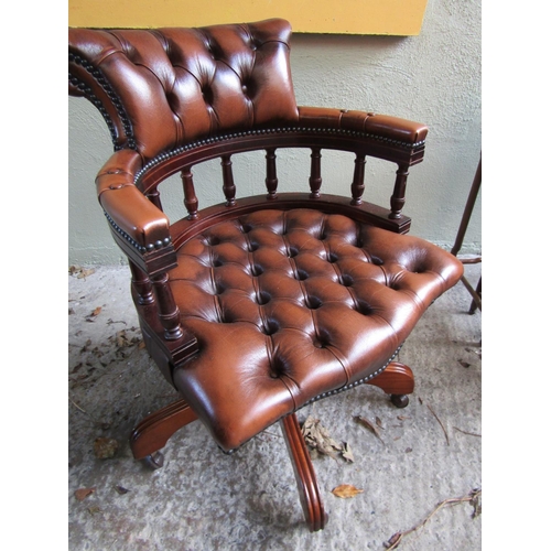 1819 - Tan Leather Deep Button Upholstered Swivel Base Framed Desk Chair or Captains Chair