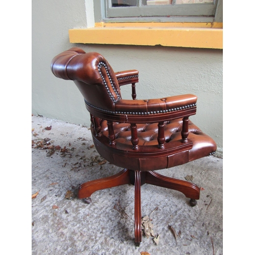 1819 - Tan Leather Deep Button Upholstered Swivel Base Framed Desk Chair or Captains Chair