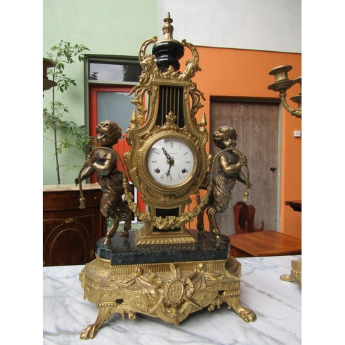 1838 - Three Part Ormolu Mounted Clock Suite Generous Form Cherub Motifs Clock Approximately 18 Inches High