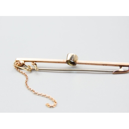 187 - 9 Carat Yellow Gold Ladies Bar Brooch Set with Oval Cut Aquamarine