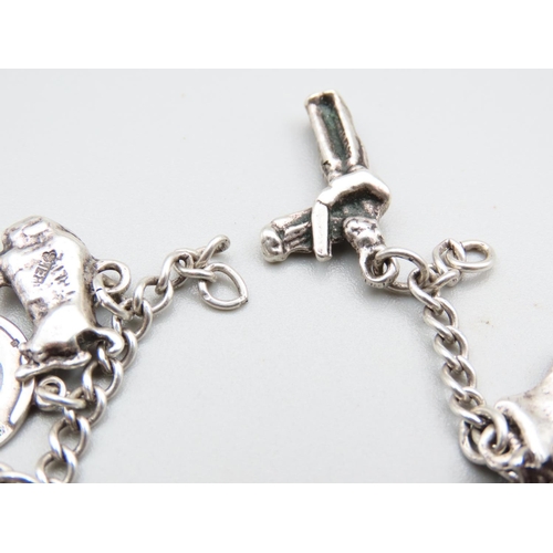 200 - Silver Charm Bracelet Antique Laden with Various Novelty Charms Including Swordfish, Unicycle, Dance... 