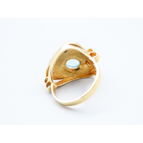 207 - 18 Carat Yellow and White Gold Modernist Form Aquamarine Set Dolphine Motif Decorated Ladies Ring Si... 