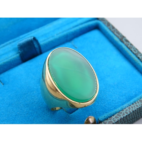 210 - Jade Set Oval Panel Ring Mounted on 18 Carat Yellow Gold Band Ring Size T