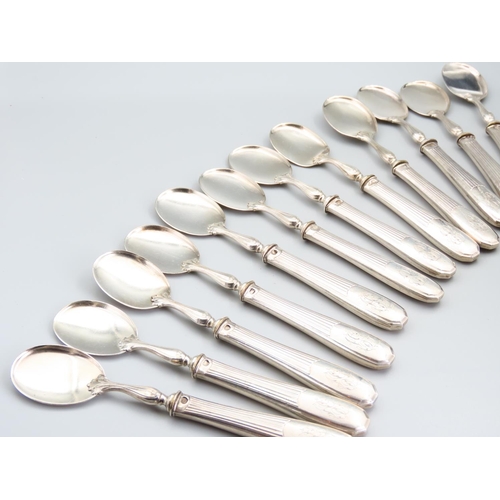 229 - Set of Twelve French Silver Handled Cutlery Spoons Attractively Detailed Each 16cm Long