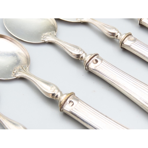 229 - Set of Twelve French Silver Handled Cutlery Spoons Attractively Detailed Each 16cm Long